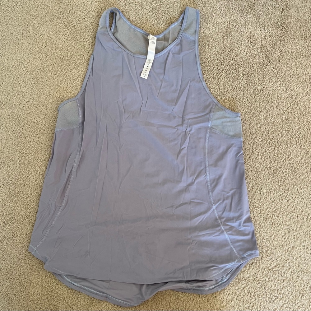 Lululemon tank top with cute mesh details, size 6